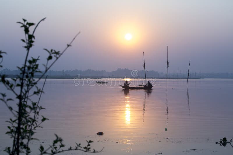 Silhouette sunrise views in Kaliganga River, Dhaka, Bangladesh.