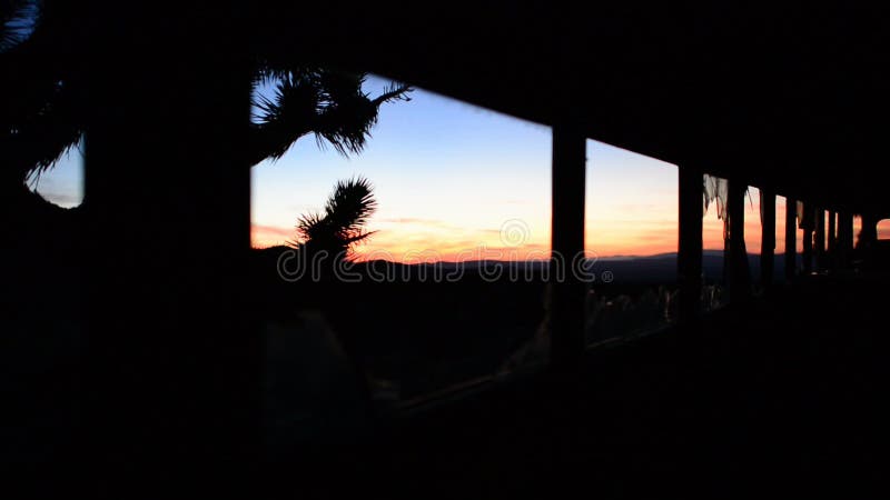 Time Lapse Dolly of Abandon Bus in the Desert at Sunset