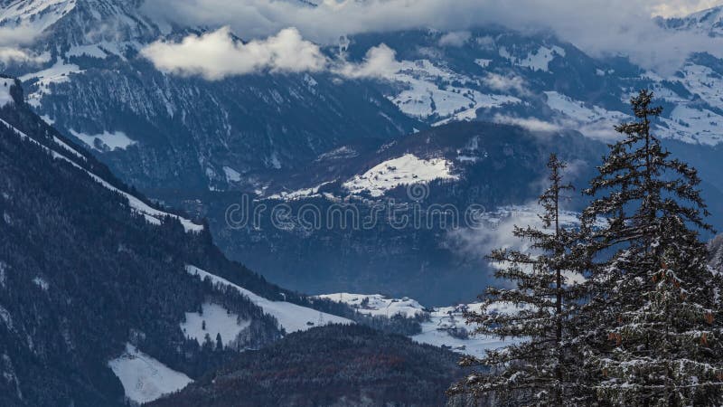 Time lapse, snowy mountain landscape. Canton of Schwyz, Switzerland stock footage