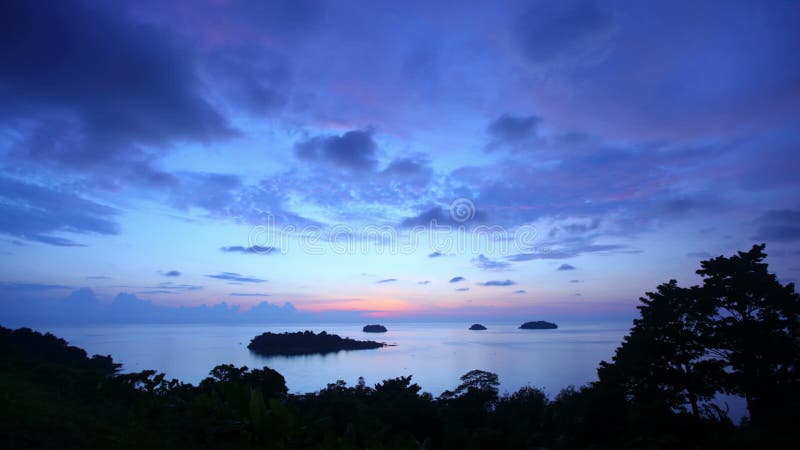 Time lapse of sunset over tropical islands