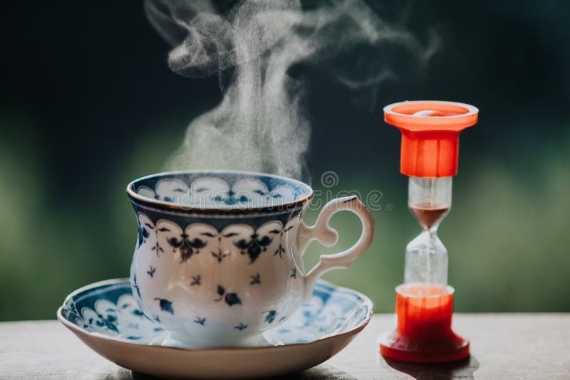 Elegant tea cup and hourglass stand shelf