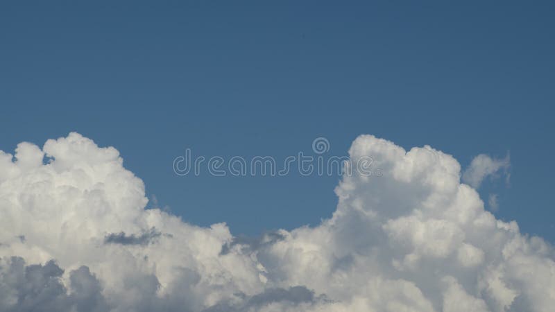 Timelapse of clouds moving in the sky. Daytime, closeup stock video