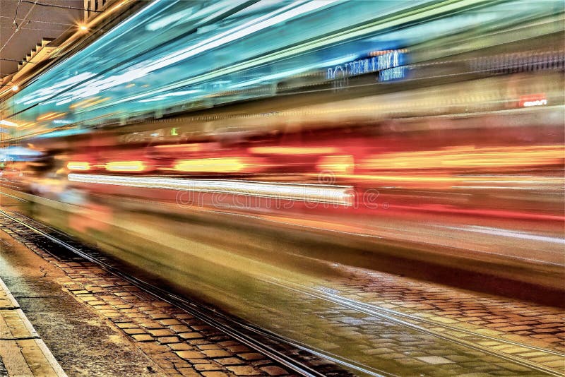 A timelapse shot of a train at night time. Night train stock images, royalty-free photos and pictures