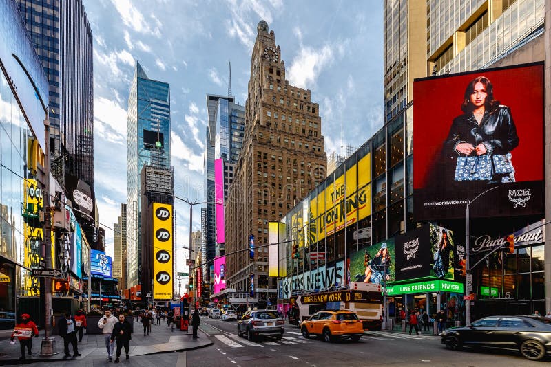 New York times Square broadway view of street showing adverts disney forever  21 twenty one Stock Photo - Alamy