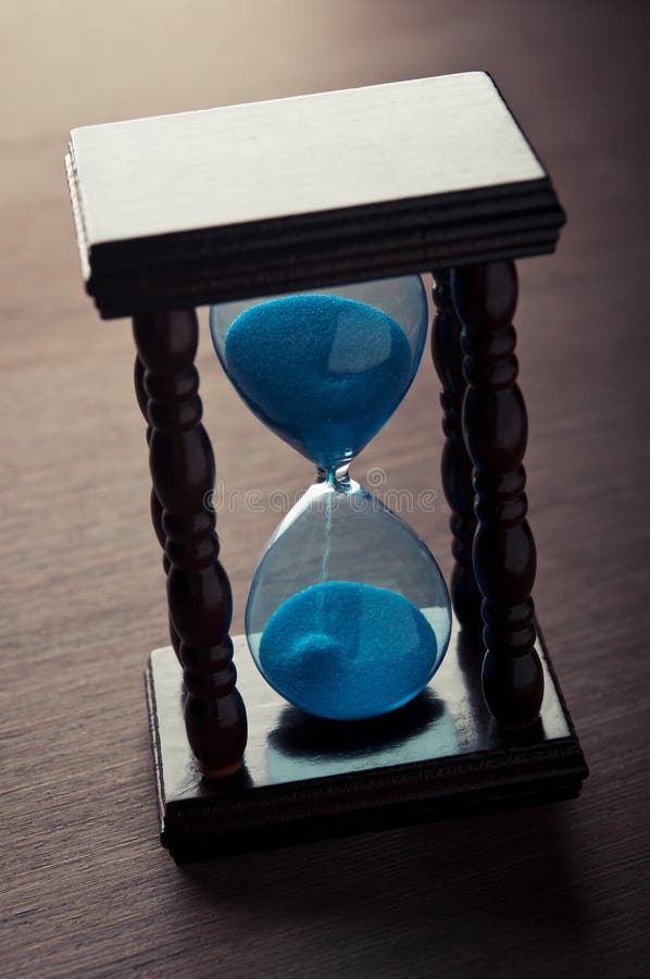 Timglaset tar tid på arkivfoton