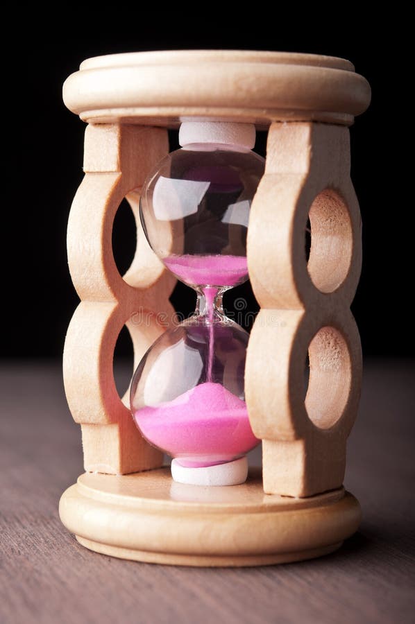 Timglaset tar tid på arkivbild