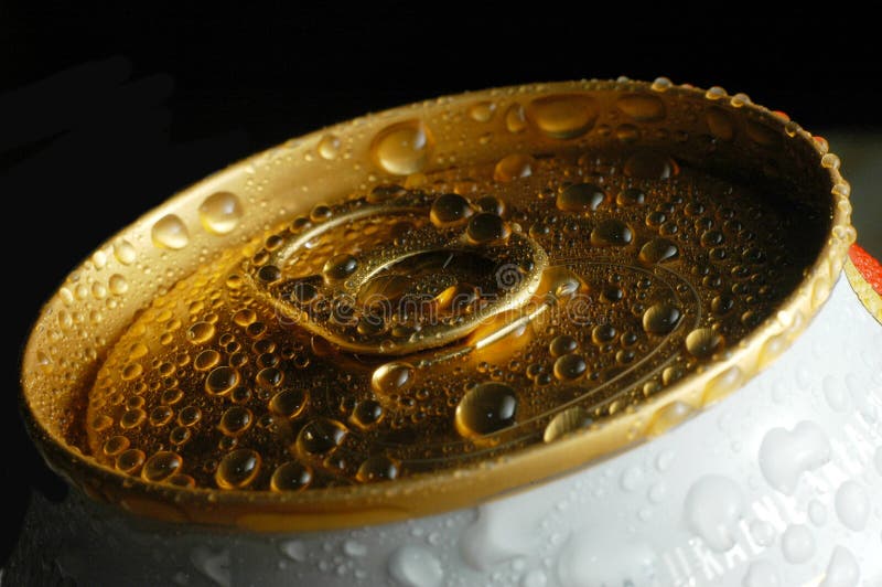 Top of a tin with drops of water