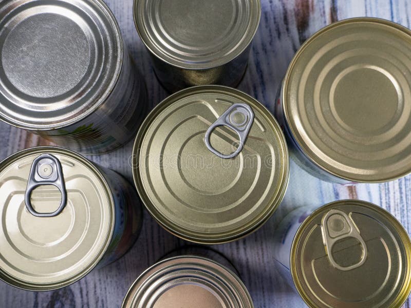 Tin Cans with Processed Food for Longterm Storage, Closeup. Food