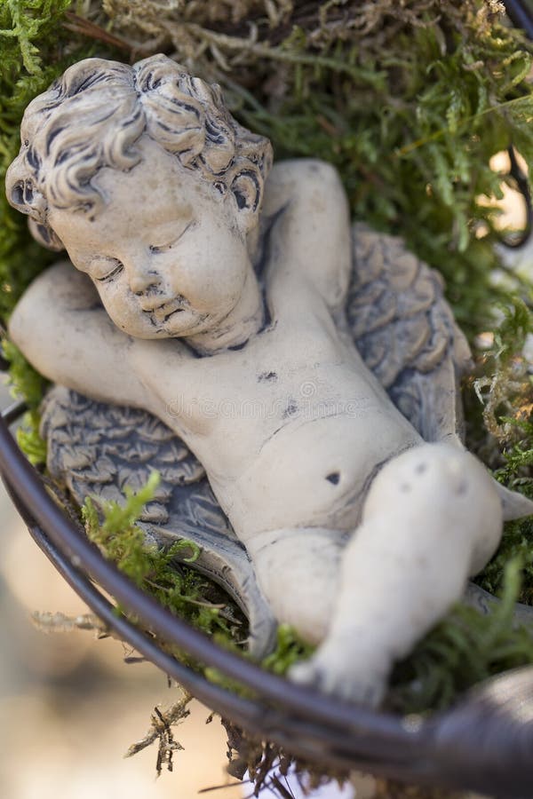 Tiny Angel Figurine in a Moss Bed in the Garden Stock Photo Image of