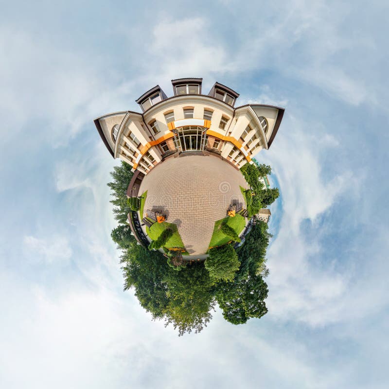 Tiny little planet with trees near beautiful building, white clouds and soft blue sky of amusement park. 360 degrees viewing angel stock photo Tiny little planet with trees near beautiful building, white clouds and soft blue sky of amusement park. 360 degrees viewing angel stock photo