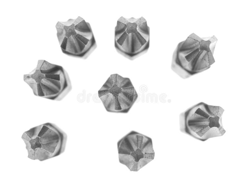 Tips of phillips head screwdriver bits on a white background stock images