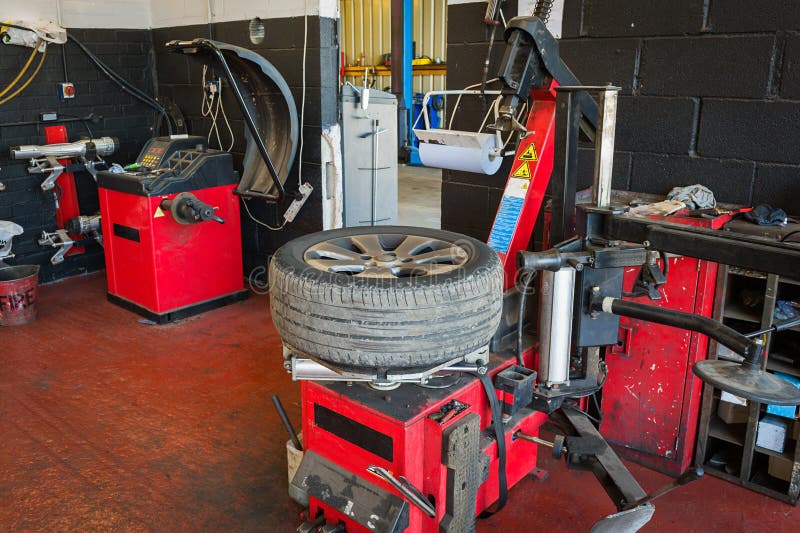 Tire service stock image. Image of machinery, balancing 60550591