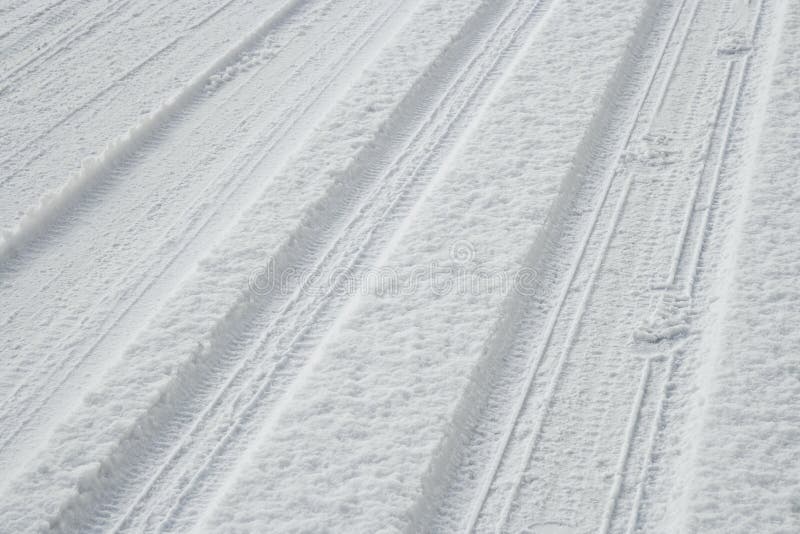 Tire Tracks and Footstepts on Fresh Snow Stock Image - Image of winter ...