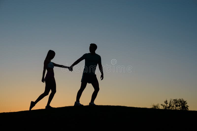 Tired athletes climb the mountain. stock image Tired athletes climb the mountain. stock image