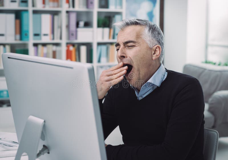 Tired bored office worker yawning stock images Tired bored office worker yawning stock images