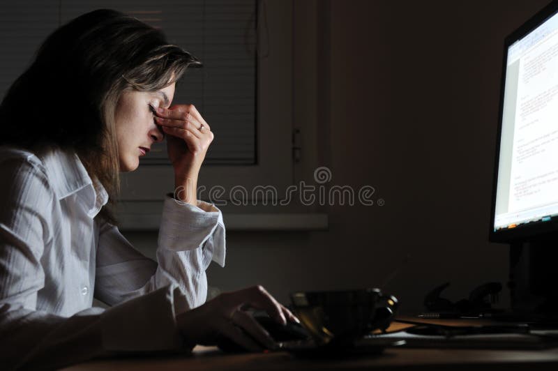 Tired business person with headache stock photography
