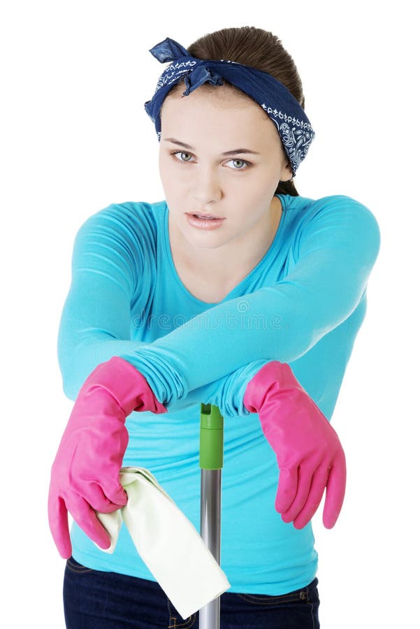 Tired and exhausted cleaning woman royalty free stock image.