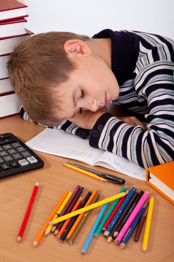 Tired schoolboy on a white background. Boring kid white stock images, royalty-free photos and pictures