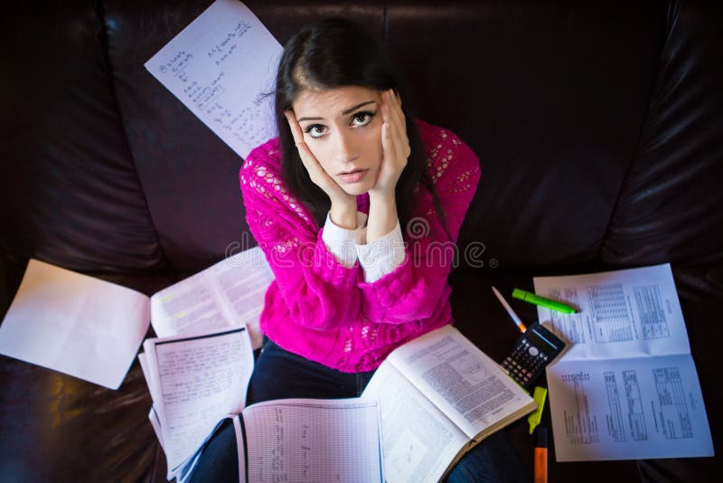 Tired student having a lot to read.Worried stressed student.Student is studying. Study up