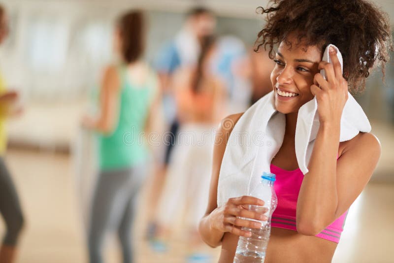 Tired and sweaty mongrel woman after workout stock image Tired and sweaty mongrel woman after workout stock image