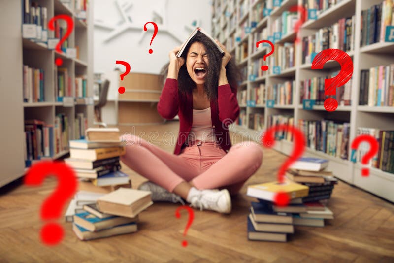 Tired university student has difficulty to study. Concept of stress, question and difficulty royalty free stock image Tired university student has difficulty to study. Concept of stress, question and difficulty royalty free stock image