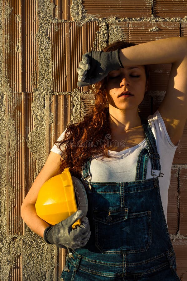 Tired Woman Bricklayer royalty free stock photography