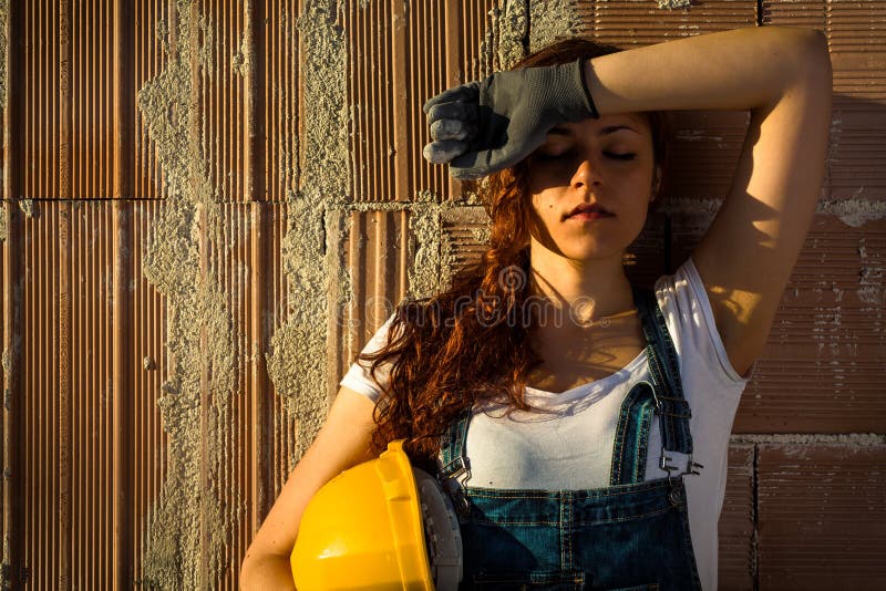 Tired Woman Bricklayer stock images