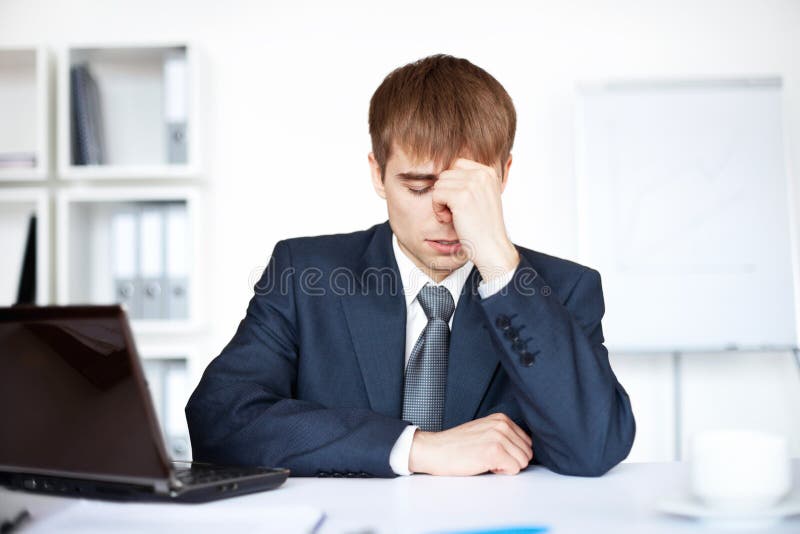 Tired young business man with problems and stress stock photography Tired young business man with problems and stress stock photography