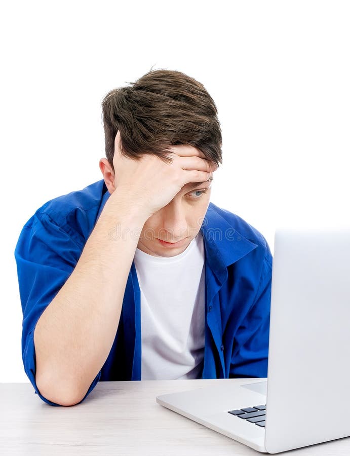 Tired Young Man with a Laptop royalty free stock photography