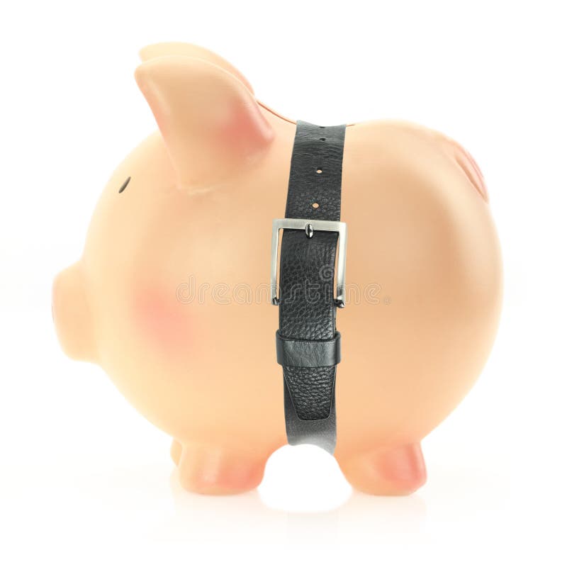 Piggy bank with a belt. Economic crisis concept. Piggy bank with a belt. Economic crisis concept