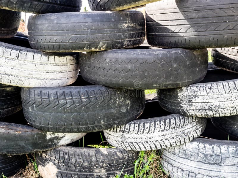Tires Stacked on Top of Each Other. Large Pile of Tires Dump. Illegal