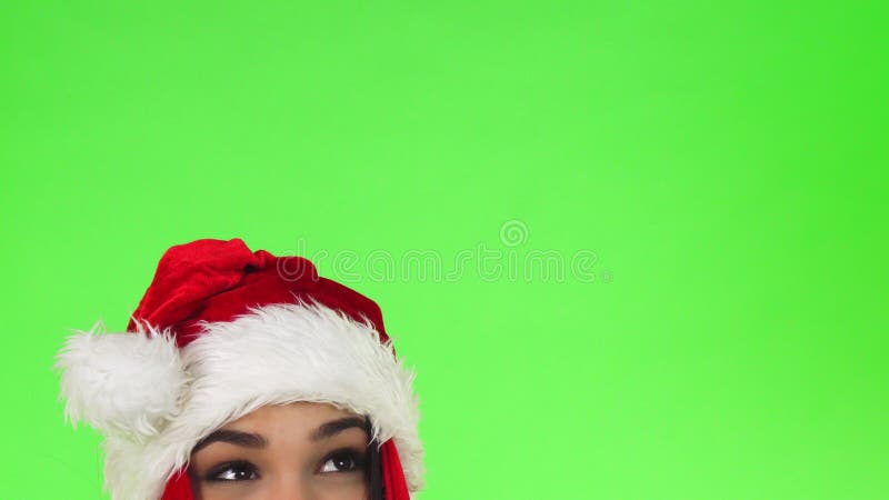Tiro cosechado de los ojos de una muchacha de la feliz Navidad que mira el espacio de la copia fotografía de archivo libre de regalías Tiro cosechado de los ojos de una muchacha de la feliz Navidad que mira el espacio de la copia fotografía de archivo libre de regalías