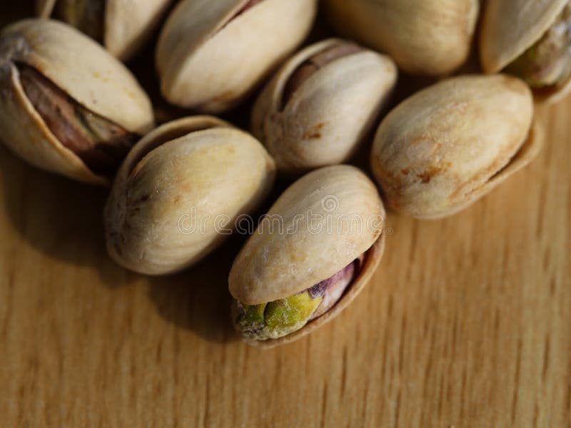 Tiro macro - nueces de pistachos imagen de archivo libre de regalías Tiro macro - nueces de pistachos imagen de archivo libre de regalías
