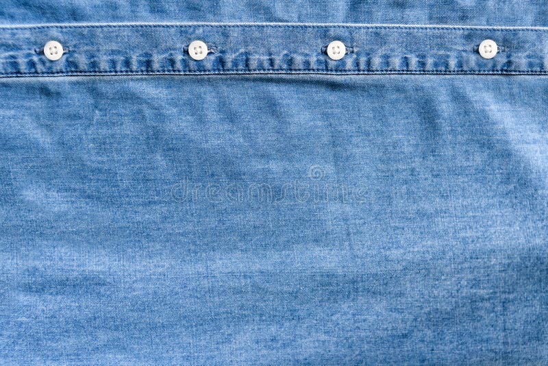 tissu bleu-clair de denim Placket blanc de bouton V?tx le concept photos libres de droits tissu bleu-clair de denim Placket blanc de bouton V?tx le concept photos libres de droits
