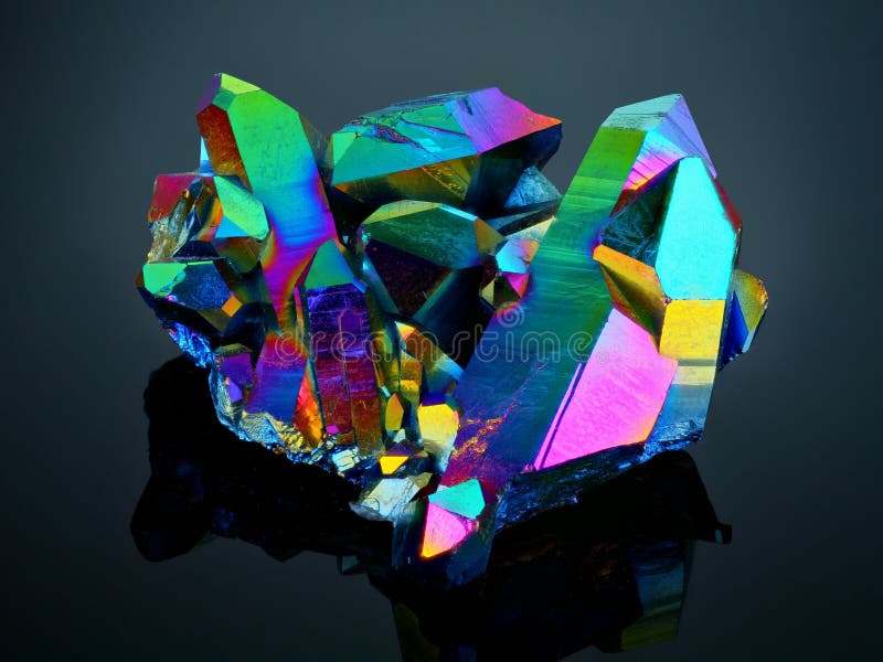 A titanium rainbow aura quartz crystal cluster detailed view with sharp focus.