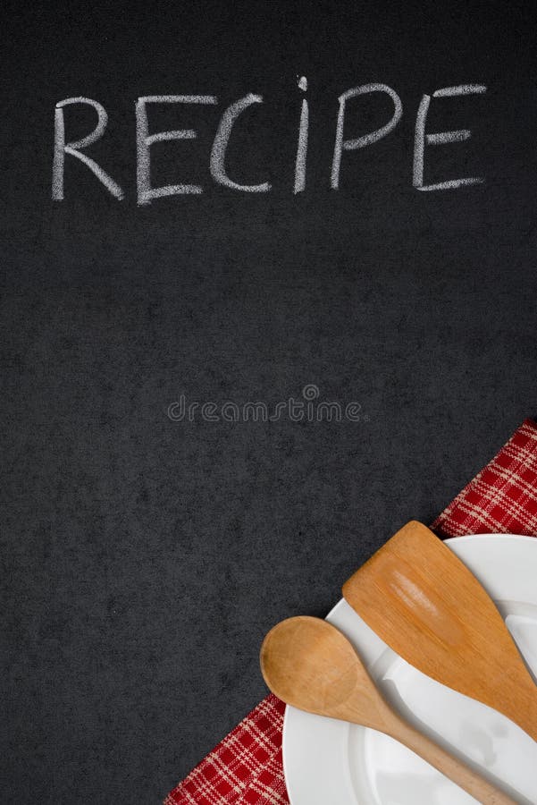 Title recipe written in chalk on a blackboard, empty plate