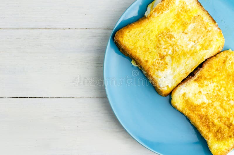 Toast in an Egg on a Blue Plate. Breakfast Stock Photo Image of bread