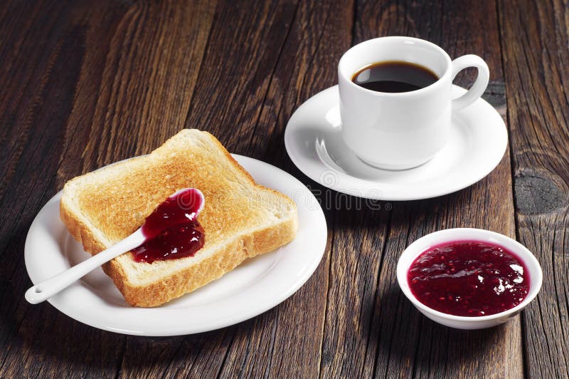 Toast with jam and coffee stock photo. Image of roasted ...