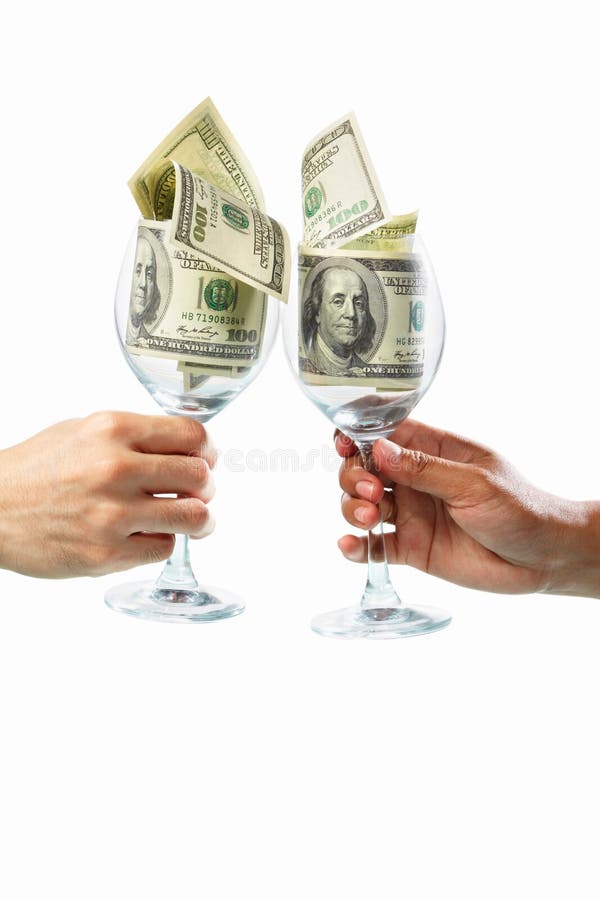 Toast using glass filled with dollar bills