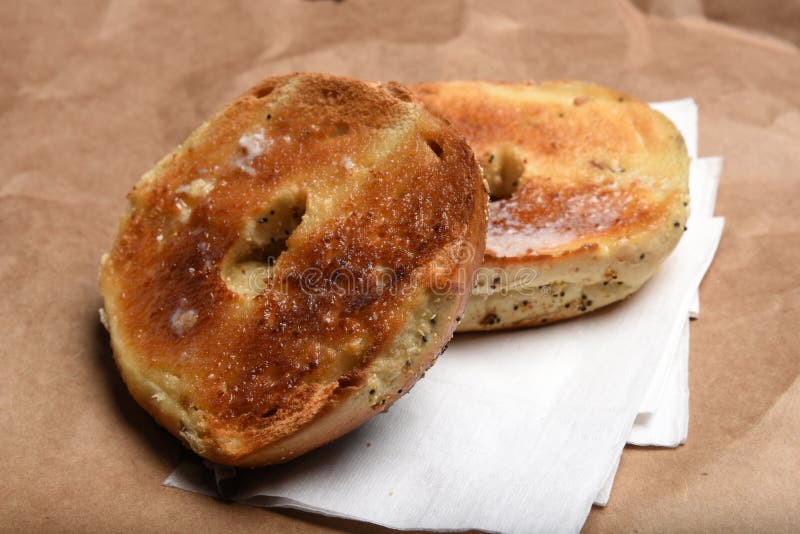 Toasted bagel and coffee stock image. Image of spoon 12601037