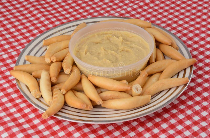 Hummus and bread sticks stock image. Image of health 23991075