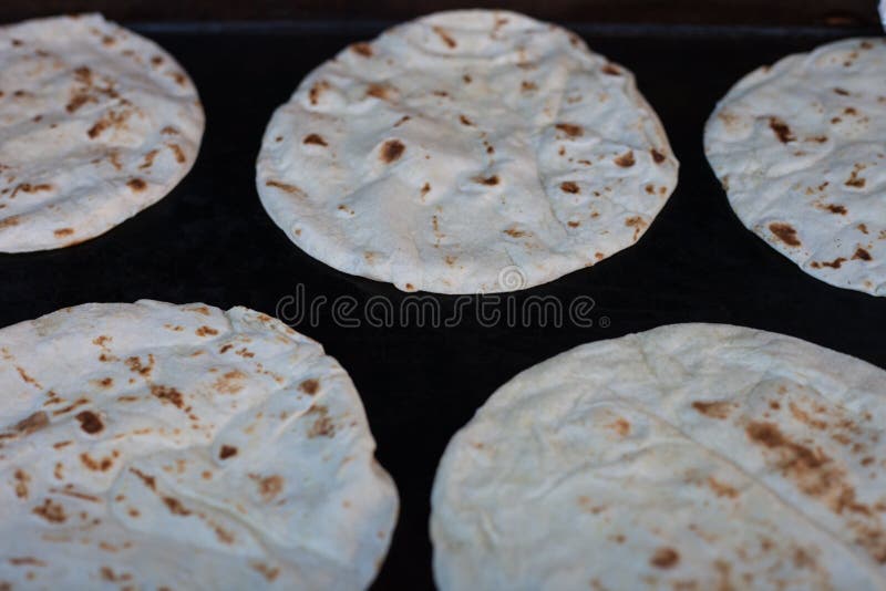 Toasting Tortillas on Black Background Soft Focus Stock Image Image