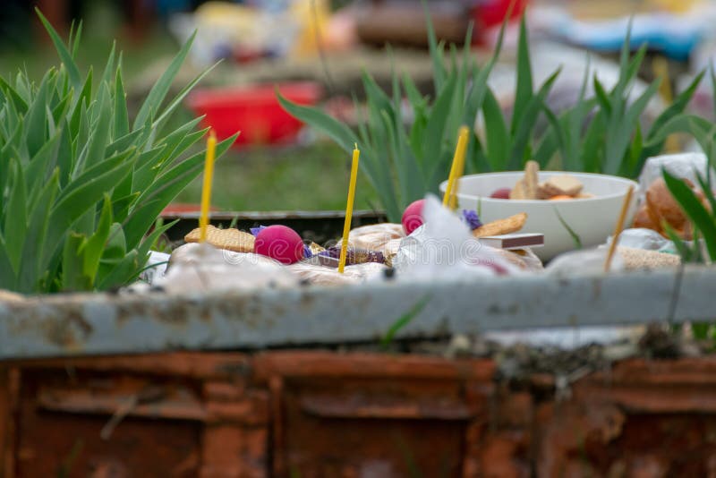 TOCUZ, MOLDOVA- 16 APRIL, 2018: Goods on the graves in the cemetery celebrating the dead during Memorial Easter