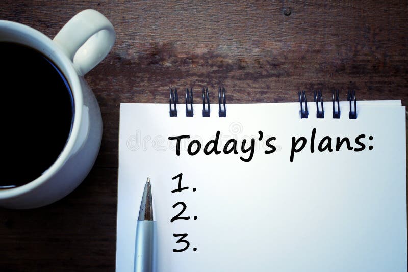 Today plans list with number written on notebook, a pen, and a white cup of morning coffee on a wooden table. Every organized