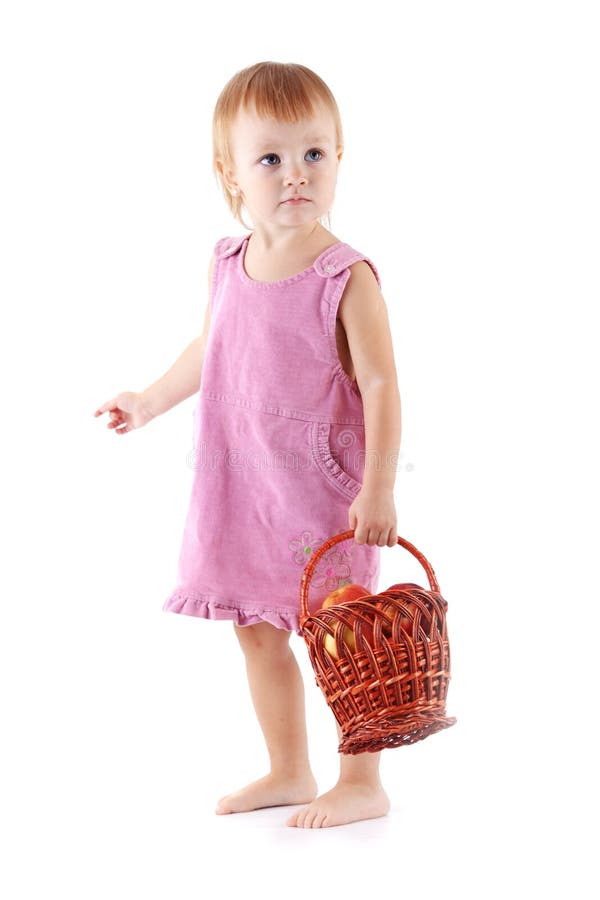 Toddler with apples in basket