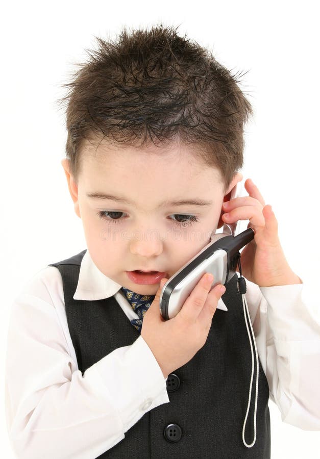 Toddler Boy in Suit on Cellphone royalty free stock image