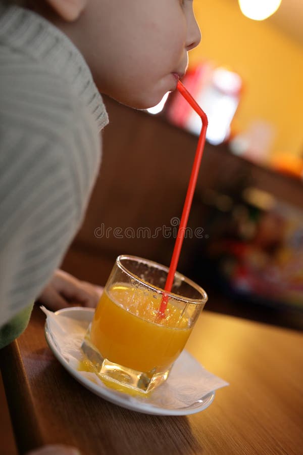 Toddler drinking juice stock photo. Image of drink, male 35760906