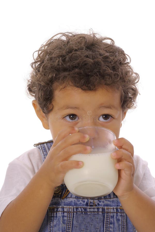 Toddler drinking milk upclose