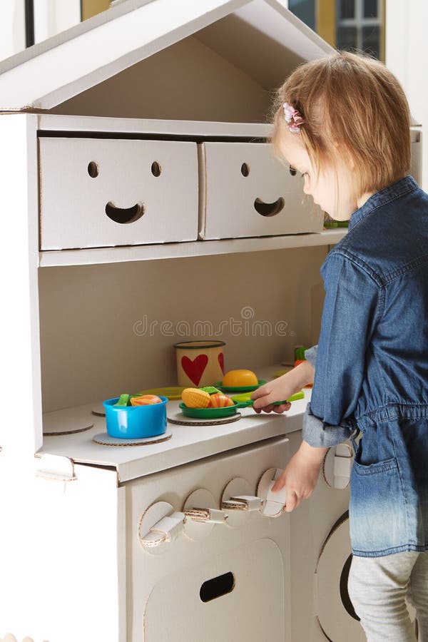 Toddler Girl Playing with Toy Kitchen at Home Stock Image - Image of kindergarten, home: 109251041