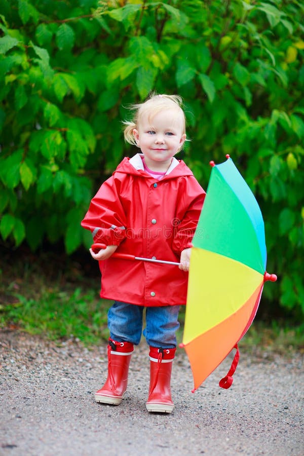 The Little Girl with a Yellow Umbrella Stock Image - Image of small ...